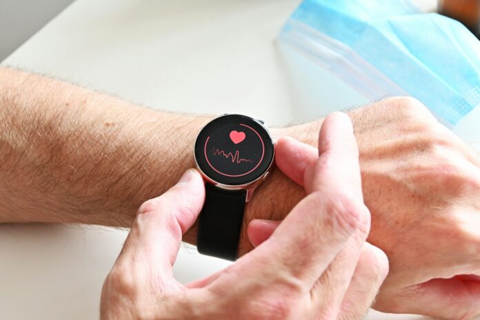 a person holding a stopwatch